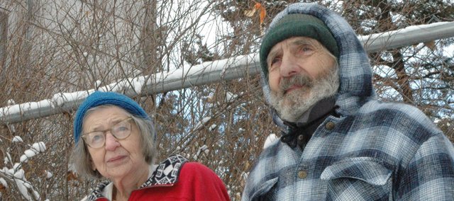 Phyllis A. Gable, left, and her brother Charles Gable stand on the land that has been their family's farm since their father bought it in 1921. The two have lived on and farmed the land for 87 years and are now being honored with a 2007 Leavenworth County Bankers' Soil Conservation Award for the waterways, terraces, windbreaks and buffer strips they've added to protect against soil erosion.