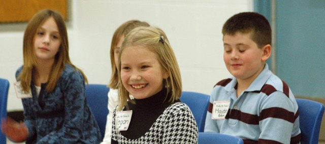 West Elementary School third-grader Megan Smoot shows her excitement after winning the West Elementary Spelling Bee. Spelling bees took place at Eudora Middle School and West Elementary School last week. The winners will go on to the Douglas County Spelling Bee. Go to Page 9A for more on the spelling bee.