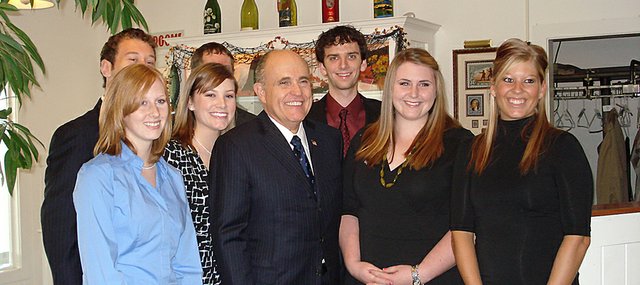 Andrew Cameron, back row at far right, poses with Rudolph Giuliani, R-N.Y., front center, and other members of Creighton University's College Republicans during one of Giuliani's visits to Iowa before the state's Jan. 3 presidential caucuses. Cameron was a chauffeur for Giuliani during one of his visits and was able to drive him to two political events where Giuliani spoke.