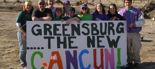 A handful of Kansas State University students spent spring break helping rebuild Greensburg, which was hit by an enhanced F5 tornado in 2007. One of those K-Staters is Megan Holton, pictured fifth from the left, a Tonganoxie High School graduate now a sophomore at K-State. Several local students bypassed Cancun and other party spots to help others this spring break.
