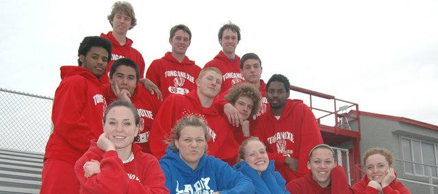 The Tonganoxie High track team keeps things close and loose. This year's seniors are: (front row from left) Katie Chenowith, Elise Drennan, Christy Weller, Roxi Grizzle, Sami Franiuk (middle row) Isiah Sawyer, Chance Rawlins, Wesley Armstrong, D.J. Gray, Kendrick Whittington (back row) Eric Hart, Patrick Holton, Tyler Gurss, Gabe Belobrajdic and (not pictured) Tracie Hileman.