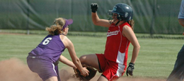 Sarah Flaherty slides safely into second base in the ninth inning of Tonganoxie's 1-0 win against Baldwin last week. Flaherty scored the winning run that helped place the Chieftains in a regional championship game against Santa Fe Trail. THS lost that game, and a chance to go to state, as the Chargers pervailed, 6-5, in extra innings.