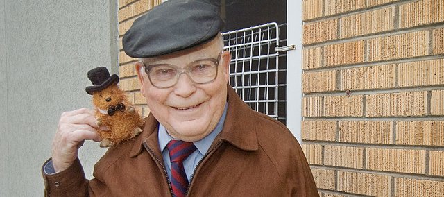 Dr. Phil Stevens, also known as Tonganoxie Phil each Groundhog Day, did not see his shadow Tuesday. Stevens took on the role of Tonganoxie Phil for a Kansas City, Mo. radio station for a few years and continues the “meteorology” role today. Pictured with him is a stuffed toy groundhog that a patient gave him a few years ago.