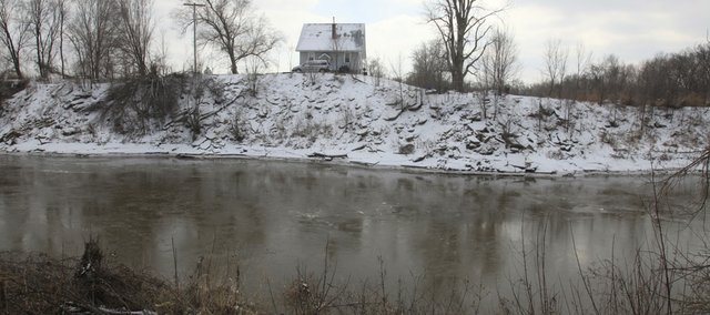 Linwood city officials recently met with the U.S. Army Corps of Engineers to discuss whether the city could find the money to contribute to a project that would fix erosion problems along Stranger Creek. The creek meanders through Linwood on its way to the Kansas River — and several buildings, including this home owned by Danny Saultz, 19302 Golden Rd., sit precariously close to the creek.