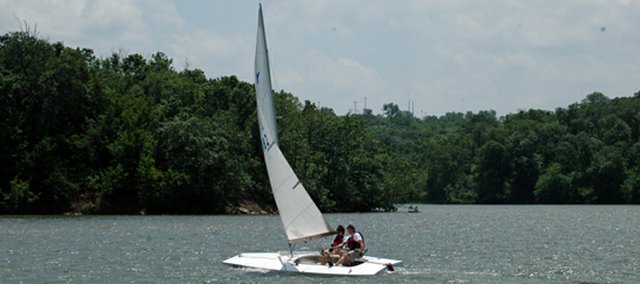Johnson County Sailing Society members Cindy and Kerry Blair of Overland Park take their boat out for a spin. The society had a “Come Sail with Us” event at noon Saturday at Shawnee Mission Park Lake. The event celebrated the completion of the Sailing I class, offered through Johnson County Park and Recreation District, and offered free sailboat rides to the public.