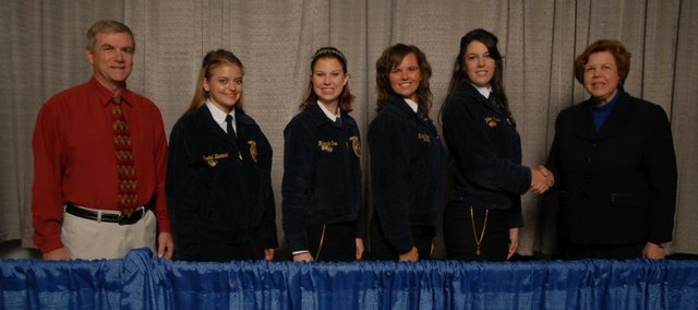 The Tonganoxie High FFA horse judging team was recognized at a national event this past month in Indianapolis in conjunction with the National FFA Convention, which takes place each year there. Pictured, from left, are THS FFA adviser Randy Kraft, Rachel Bieniecki, Hannah Gee, Nikki Gee and Tayler Miles.