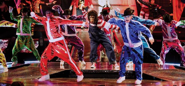 Cirque du Soleil dancers perform their interpretation of the Michael Jackson favorite, "Black or White," during a performance of Michael Jackson The Immortal World Tour. The tour, which will eventually make its way to countries across the globe, will make a stop in February 2012 at the Sprint Center in Kansas City, Mo.