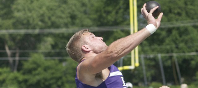 Dayton Valentine puts power behind one of his shot put tosses on his way to winning the 4A regional title in the event last Friday. The junior also won the discus and is the favorite to bring home state championships in both events this weekend in Wichita.
Follow Valentine's success in the event and that of others on the BHS boys and girls teams vying to repeat as state champions here at baldwincity.com