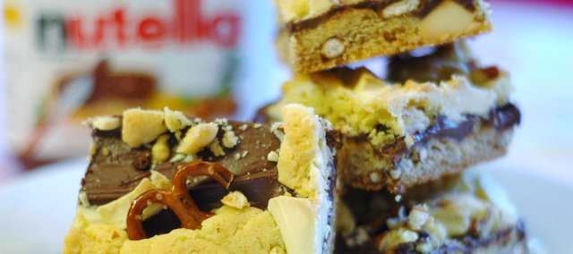 Sweet and salty come together in Pretzel-Nutella Bars with White Chocolate Chunks.