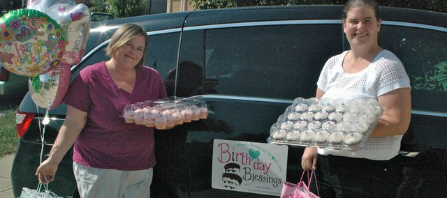 Jill Rangarajan (left) and Kelly Chambers, who live near Delaware Ridge Elementary School, began the not-for-profit Birthday Blessings KC two years ago to provide all the birthday necessities for children in need.
