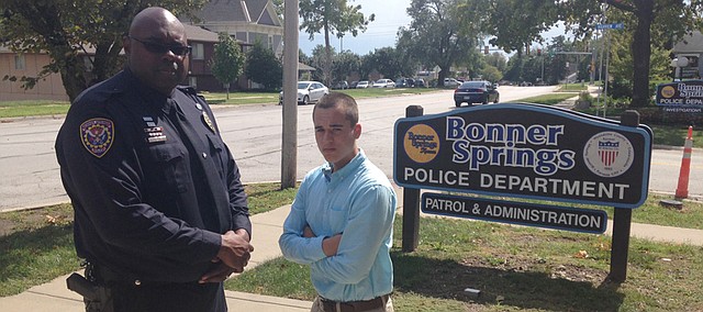 Master Patrol Officer Anthony Davis (left) and Blake McMahan, BSHS senior, are representing Bonner Springs today as one of seven "Champions of Change" partners at the White House.