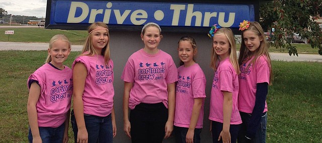 Contributed photo
Tonganoxie Elementary School fifth-grader Corinne Morgan, third from left, stands with friends at Sonic. Corinne and her friends will be serving as car hops Friday to help raise money for diabetes research. Corinne's Crew then will participate in a walk Saturday at the Truman Sports Complex in Kansas City, Mo. Pictured, from left, are Taylor Rantz, Jenna Witt, Corinne, Ally Rawlings, Katelyn Bothwell and Alaina Rogers.