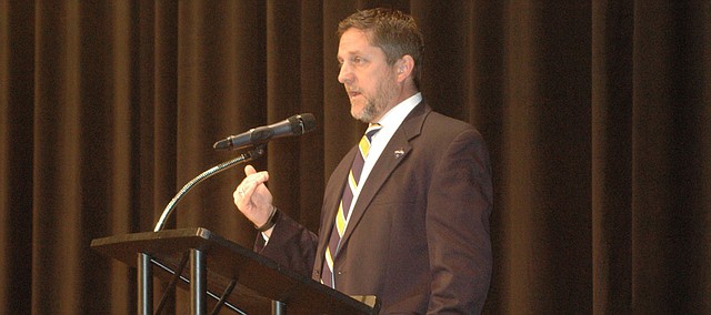 Mayor Mark Holland addresses the crowd at Bonner Springs High School for the District 7 stop on his Listening Tour. Holland is collecting opinions from residents around the county about how the Unified Government should spend the additional $12 million it expects to receive annually in sales taxes with the pay off of the Village West STAR bonds.
