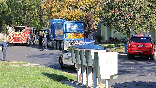 Shawnee Police are investigating after a woman was run over by a trash truck that was backing up on Tuesday morning in the 6500 block of Halsey Street.