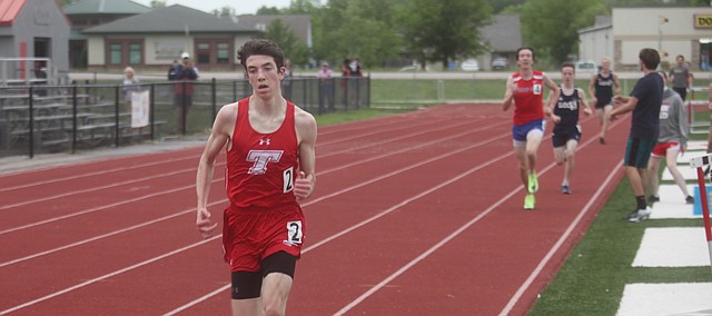 Eli Gilmore competes for Tonganoxie High during a Class 4A regional May 21 at Beatty Field in Tonganoxie. Gilmore is competing in the 800 and 3,200 at state.