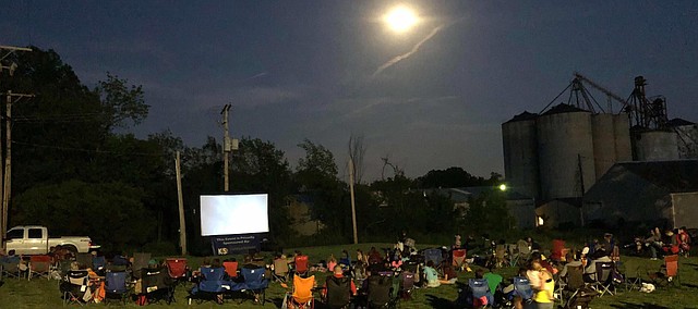 Families gather for a past Tonganoixe Business Association Movie in the Park showing at Gallagher Park.