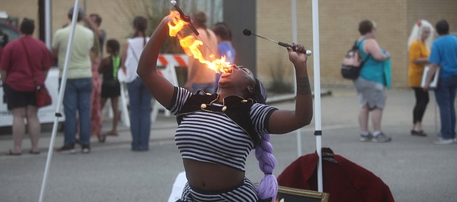 Martika Daniels performs at the Tonganoxie Plein Art Festival on Oct. 2, 2021, in downtown Tonganoxie.
