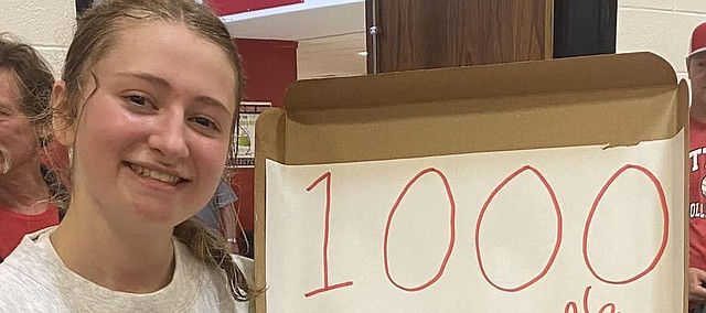 Tonganoxie High junior Kasia Baldock displays her celebratory treats after notching 1,000 assists in her volleyball career. The milestone happened during Saturday’s tourney at Rossville. The Chieftains placed fourth at the invitational.