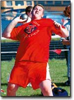 Tony Miller throws the shot put at the league meet. He won the shot
put and took second in the javelin as Tonganoxie dominated the
field events portion of the meet.