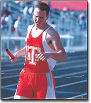 Jacob Hoffhines crosses the finish line, winning the 4x800-meter
relay at Thursday's Kaw Valley League meet in Tonganoxie. The relay
team should do well at this weeks Class 4A Regional meet in
Tonganoxie, THS Coach Phil Williams said.