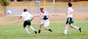 Bryan Buser clears the ball during De Soto High School's match
Friday at Immaculata. The team won the game and one Tuesday against
Piper. It next sees action Thursday at Perry-Lecompton.