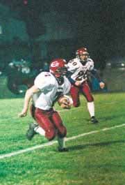 Junior Miles Cleveland runs the ball on a fourth-quarter kickoff
return for 18 yards in Tuesday's game against Anderson County at
Garnett. The Cardinals pulled out a 34-30 win in the last minute of
the game to advance to the regionals round of 4A state play-offs.
Eudora will face Coffeyville-Field Kindley at 2 p.m. Saturday at
Laws Field.
