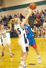 Freshman Kayla Bader attempts a shot in De Soto's win Monday
against visiting Wellsville. The Cats will travel to Paola Friday
for a game that could determine the winner of the Frontier League
Crown.