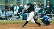 Austin DeGraeve rips a single up the middle in the Wildcats big
fourth inning in the first game of the season. De Soto scored eight
runs in the inning and went on to win 10-0.