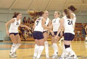 Eudora High School girls volleyball players celebrate a point
against Osawatomie. The team had much to celebrate in its Tuesday
quadrangular at Central Heights, winning all three of its matches.
The competition is expected to get tougher Saturday when the squad
participates in the Tonganoxie Invitational.