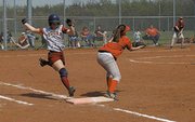 Mackenzie Salzman stretches for first in the Cards doubleheader
sweep of Anderson County on Saturday.