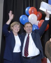 Democrat Nancy Boyda and her husband and campaign manager, Steve Boyda, celebrate her victory over Republican incumbent Jim Ryun in the race for the 2nd District Congressional seat.
