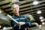 Dick Johnson, owner of Kingston Printing Inc., is buying the former
M-Pact Worldwide plant at the Intech Business Park in Eudora.
Johnson planned to close the deal Friday morning and have all his
company's equipment and about 40 jobs relocated to the site within
six weeks.
