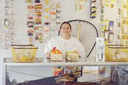 Corner Bait Shop owner Nancy Hood stands behind the counter at her
shop at the corner of Leavenworth County Road 1 and Kansas Highway
32.