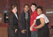 Cast members, from left, Trisha Gleisberg, Frank Armstead, James Michaels and Joyce Jackson perform "Kalamazoo" on Monday night during a rehearsal of "The 1940s Radio Hour" at the Leavenworth Performing Arts Center. The show opens at 8 p.m. Friday.