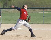 Eudora junior Kelson Boyer delivers a pitch Tuesday as the
Cardinals beat Prairie View twice. Boyer struck out 11 in the first
game.