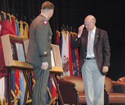 Lt. Gen. William Caldwell IV, left, and U.S. Senator Pat Roberts, R-Kan., unveil the shadow boxes for Capts. Meriwether Lewis and William Clark for the Hall of Fame at the Command and General Staff College. Their induction ceremony coincided with the dedication of the new Lewis and Clark Center that will house the command college.