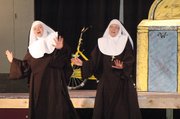 Linda Finch, left, and Trish Gleisberg rehearse a number for the upcoming performance of "Nunsense," which will benefit the building fund at St. Francis de Sales Catholic Church. The play opens this Friday at 8 p.m. at Immaculata High School and runs this weekend and next.