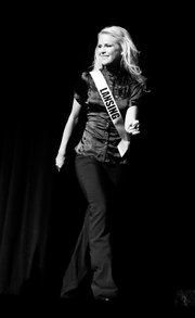 Cassie Blankenship, a 2003 graduate of Lansing High School and Miss Lansing USA, walks across the stage in the Miss Kansas USA competition Saturday, Dec. 15 at the Lied Center in Lawrence. Michelle Gillespie, 21, of Mission Hills, competed as Miss Kansas City and walked away with the Miss Kansas USA 2008 title.
