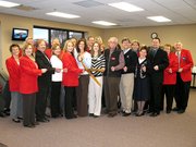 Leavenworth-Lansing Area Chamber of Commerce, city officials and staff with Preferred Physical Therapy cut the ribbon for the business at 712 First Terrace.