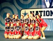The G-Force Jets Senior High All-Star team won the national championship in its division in January at the Nation's Best National Cheerleading Championships. The squad includes girls from Lansing, Lawrence, Jefferson County, Bonner Springs and LeCompton. The team, including Lansing High student Bobbi Walden, is pictured with its national championship trophy. The team is coached by Jimmy Godfrey, assistant coach of the cheer squad at the University of Kansas.