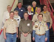 Former Cubmasters of Pack 3165 gather with over 300 other people Saturday, Feb. 23, to celebrate the 50th anniversary of the founding of scouting in Lansing back in 1958. The former Cubmasters in attendance were: (front row left to right) Howard (Howie) Kings; Andy Matzeder, the first Cubmaster; Karl Gibson; (second row left to right) Dan Golden; Dean Moburg; (third row left to right) Paul Icke; Dan Mosier; Doug Lilly; (fourth row left to right) Ron Bishop; and Loren Russell.