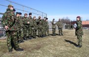 Army officers from the United Kingdom's Intermediate Command and Staff Course talk strategy during a military tactical exercise. 180 British soldiers traveled to Kansas for three weeks to work with American officers at Fort Leavenworth on tactical operations.