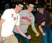 Last April, Tonganoxie High School Student Council members Tyler Miles, Mike Fonkert and John Davis show off their blood donation bandages and stickers during a community blood drive on the THS west campus. StuCo sponsor Jessica Johnston said the drive, led by the Community Blood Center in Kansas City, Mo., was the school's largest with 106 units, or pints, of blood donated. The Student Council provided door prizes including video gaming unit, a digital camera and gift certificates to Target and Best Buy, to a few lucky donors,.
--
