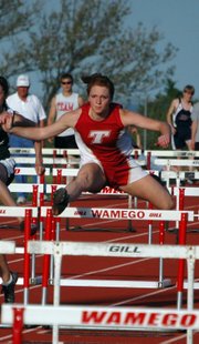 Tracie Hileman qualified for state in four events, including her second-place finish in the 100-meter hurdles. She won the triple jump, finished second in the long jump and took third in the high jump.