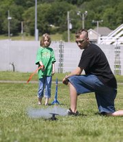 Jacob Reynolds helped the members of this year's 4-H Club tech camp launch rockets the 4-H'ers designed and constructed themselves. The camp also taught the Leavenworth County youths about robotics and geoscapings.