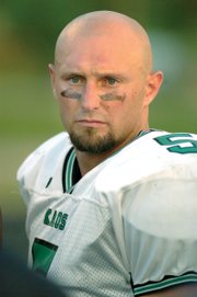 Former University of Missouri basketball player Jason Sutherland is the quarterback of the Kansas Kaos football team.