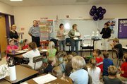 Sara Oberheide and Lee Hanson were surprised by the Baldwin Education Foundation "prize patrol" on Friday morning. Both Baldwin Elementary School Intermediate Center teachers were recipients of a shared Innovative Project Grant.