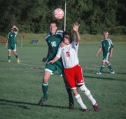 Pat Gallagher battles a Basehor-Linwood defender for position on Thursday at Chieftain Park. Tonganoxie tied the defending Kaw Valley League champions, 2-2.