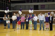 The Baldwin High School volleyball team celebrated its senior night last week before its match with Tonganoxie. The seniors, from left, are manager Hannah Elder, Ashley Hadl, Leigh Schenewerk and Olivia Catloth.