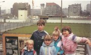 Carl Slaugh’s children stand 19 years ago in Berlin where the Berlin Wall fell Nov. 9, 1989. The family stayed on vacation a bit longer to be there for the historic event.